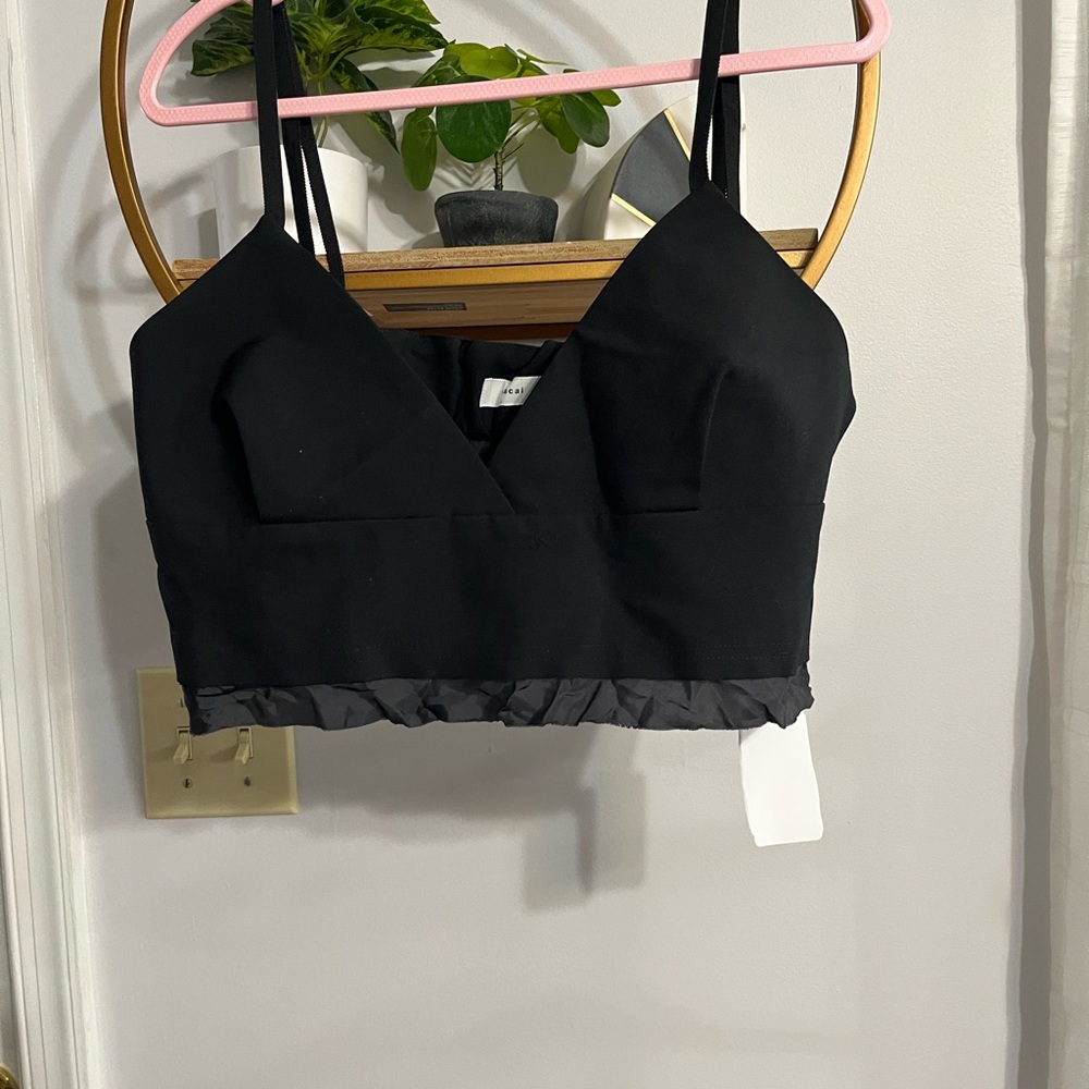 Sacai black top.